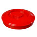A red plastic lid with a hexagon on top.