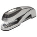 A Swingline Optima 25 Sheet stapler with a silver body and black handle.