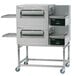 A large stainless steel Lincoln Impinger double conveyor oven.