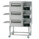 A large black and silver Lincoln Impinger FastBake triple conveyor oven with three belts.
