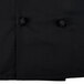 A black Mercer Culinary Millennia long sleeve cook jacket with cloth knot buttons.