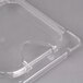 A Carlisle clear plastic food pan lid with a notch.