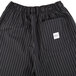 A pair of black pants with white pinstripes.