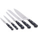 A group of Mercer Culinary Renaissance forged knives with black handles in a wood and glass knife block.