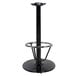 A Lancaster Table & Seating black cast iron bar height table base with a round base.