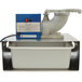 A Benchmark USA Snow Blitz snow cone machine with a white tub and a blue handle.