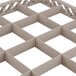 A white plastic grid with 16 square compartments.