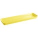 A yellow rectangular Cambro market pan with a handle.