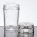 An American Metalcraft clear glass shaker with a stainless steel lid.