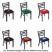 A set of 4 black steel Holland Bar Stool NCAA chairs with logos on the padded seats.