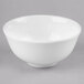 A white bone china bowl with a white rim.