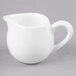 A white Reserve by Libbey creamer pitcher with a handle.