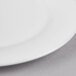 A close up of a Reserve by Libbey International bone china dessert plate with a white rim.