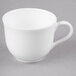 A white Reserve by Libbey bone china coffee cup with a handle on a gray surface.