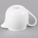 A white bone china tea pot with a handle and lid.