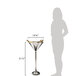 A woman using an American Metalcraft martini wine stand to fill a martini glass.