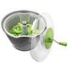 A white Matfer Bourgeat salad spinner with a green lid.