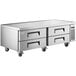 An Avantco stainless steel 4 drawer refrigerated chef base on wheels.