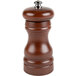 A Fletchers' Mill walnut stain wooden pepper mill with a silver top and wooden handle.
