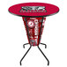 A round bar height table with the University of Alabama logo on it.