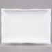 A white rectangular CAC porcelain platter with a thin rim.