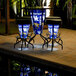 A Holland Bar Stool University of Kentucky LED pub table and stools with blue and white Kentucky logos.