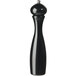 A Fletchers' Mill Marsala black pepper mill with a white base and black handle.