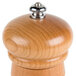 A Fletchers' Mill Federal cherry wooden pepper mill with a silver top.
