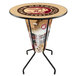 A Holland Bar Stool Indian Motorcycle round bar table with a logo on it.