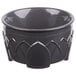 A graphite grey Dinex insulated bowl with a carved design.