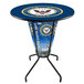 A Holland Bar Stool navy blue round bar height table with a United States Navy logo on it.