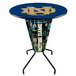 A round bar height table with the University of Notre Dame logo on it.