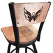 A black steel bar height swivel chair with a maple back and seat and a Washington Capitals logo laser engraved on the back.