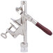 A silver metal Franmara counter mount wine bottle opener with a wooden handle.