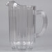 A clear plastic Rubbermaid Bouncer Pitcher with a handle.