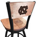 A black steel bar height swivel chair with a maple back and seat and a University of North Carolina logo laser engraved on it.