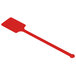 A red plastic rectangular stirrer with a handle.