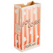 An EcoCraft paper bag for popcorn with a striped pattern.