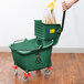 Lavex Janitorial 35 Qt. Green Mop Bucket & Side Press Wringer Combo Main Thumbnail 6