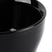A close-up of a black Cambro insulated bowl.