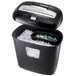 A black Swingline paper shredder with a black container full of shredded paper.