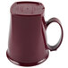 A red Cambro insulated mug with a handle and lid.
