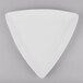 A close up of a white Libbey Porcelana triangle shaped plate.