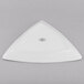 A white Libbey triangle shaped porcelain plate.