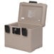 A beige FireKing lockable fire and water chest with a black handle.