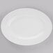 World Tableware 840-520R-13 Porcelana 13 3/4" x 9 7/8" Oval Bright White Wide Rim Porcelain Platter - 12/Case Main Thumbnail 2