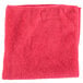 A red Unger SmartColor Microfiber cleaning cloth.