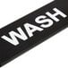 A black sign with white text that says "Wash" and "Rinse"