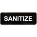 A black Vollrath Traex sign with white text that says "Sanitize"