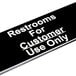 A black and white Vollrath sign that says "Restrooms for Customer Use Only"